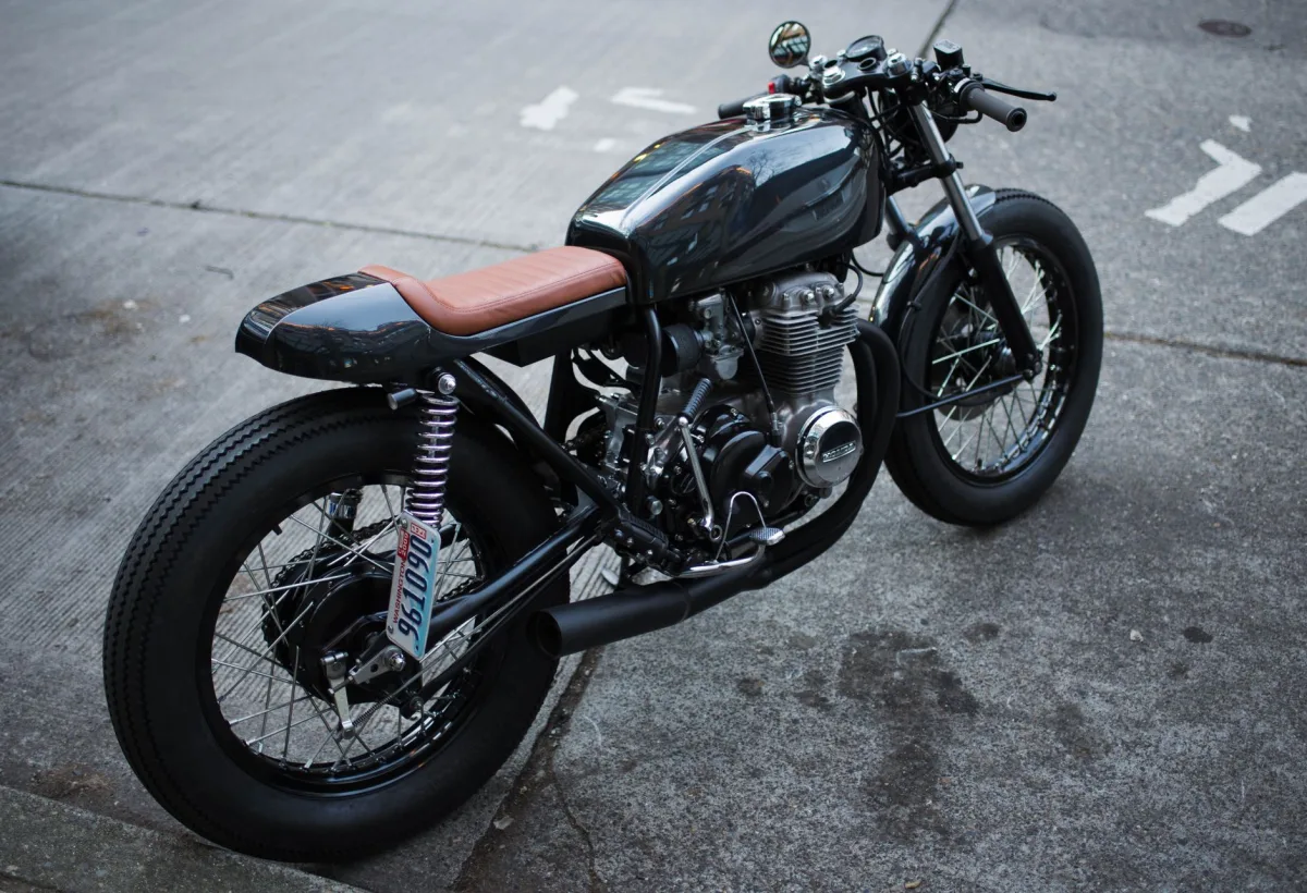 Retro-style parked on an urban street, showcasing a classic design.